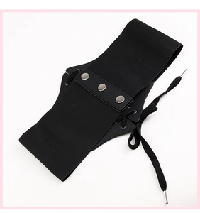Detail of black wide elastic corset belt featuring silver snaps and side lace-up design