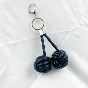Handmade black leather monkey fist knot keychain with silver metal hook and key ring