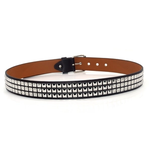 Close-up of black leather punk belt with triple-row silver pyramid metal studs