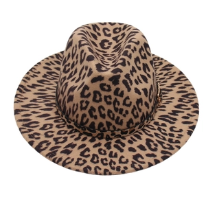French style leopard print fedora hat with a black band and gold buckle on white background