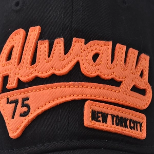 Black cotton baseball cap featuring vintage orange Always 75 New York embroidery