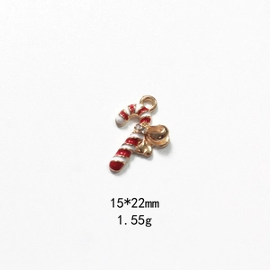 Detail view of candy cane alloy pendant with dimensions 15x22mm and weight 1.55g