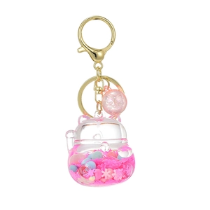 Cute pink Fortune Cat liquid quicksand keychain with gold ring and acrylic charm