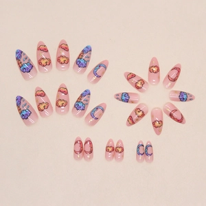 Almond-shaped gradient pink press-on nails featuring hand-painted clouds and moon patterns