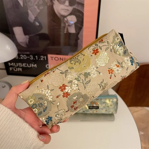 Floral embroidered brocade pouch with gold zipper for stationery and makeup storage