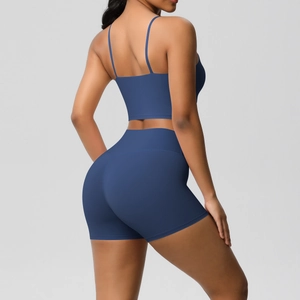 Detail of navy blue yoga set showing the cross back straps and high waist fitness shorts