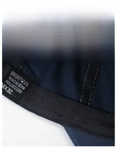 Macro shot of 100% cotton baseball cap interior featuring a wide sweatband and stitching