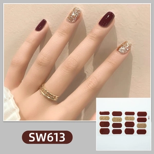 Deep red and gold glitter nail stickers set SW613 applied on mannequin nails