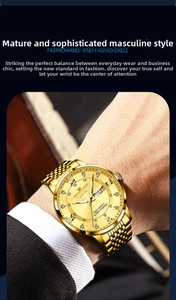 Detail of men's gold business watch with steel strap and dual calendar display