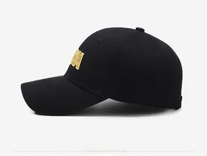 Side view of black cotton baseball cap showing yellow 3D embroidery on the side panel