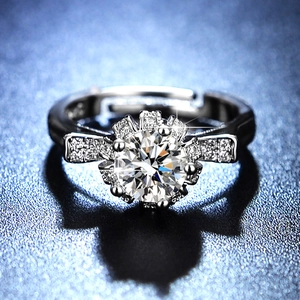 Macro detail of S925 sterling silver ring with brilliant round halo moissanite stone