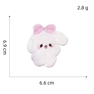 Detailed view of 3D plush rabbit embroidery patch with pink bow and precise measurements