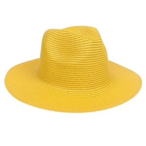 Close-up of bright yellow straw fedora hat showing intricate woven texture and sun shade brim