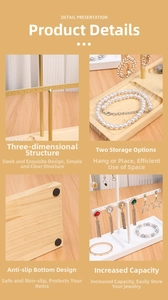 Detail view of wooden base and metal rack structure for earring display stands