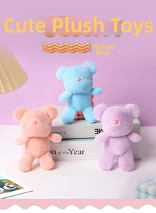 Close-up of three colorful plush bears in pink blue and purple with soft heart-shaped noses