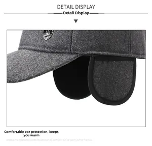 Detail view of winter baseball cap with ear flaps and warm fleece lining for men