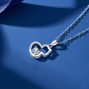 Elegant S925 silver gourd pendant necklace with moissanite diamonds on blue silk background