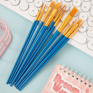 Detail of 10-piece nylon paint brush set with blue handles and various tips for art