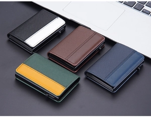 Flat lay of multiple RFID blocking card holders in contrast colors on a dark desk