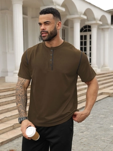 Detail of vintage waffle knit short sleeve polo shirt with 4-button placket and texture