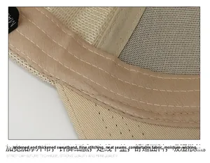 Detailed close-up of beige mesh cap featuring sweatband stitching and breathable fabric
