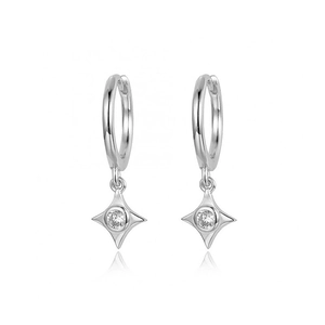 Elegant S925 silver star earrings with sparkling zircon crystals on white background