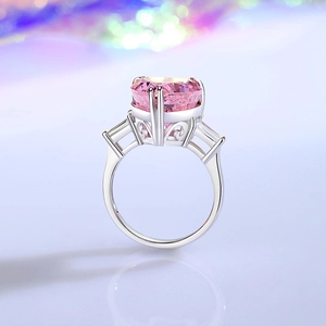 Exquisite S925 sterling silver ring with a large pink heart-shaped gem and side diamonds