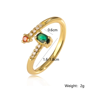 Detail view of 18K gold plated ring with green gemstone and weight specifications