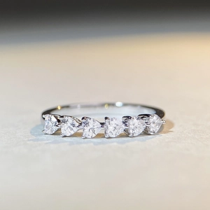 Elegant S925 sterling silver ring featuring six sparkling heart-cut zirconia stones