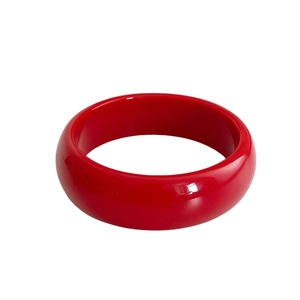 Minimalist wide red resin round bangle with a smooth polished mirror finish for women