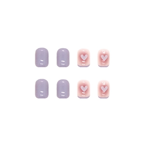 Short lavender and blush heart press-on nails set with glossy finish on white background