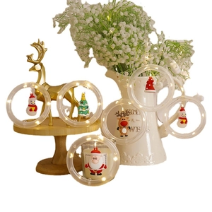 Christmas LED curtain string lights featuring Santa, snowman and reindeer in warm white rings