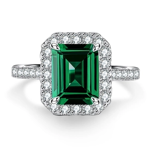 Elegant S925 sterling silver ring featuring a 3ct emerald-cut green stone with halo accents