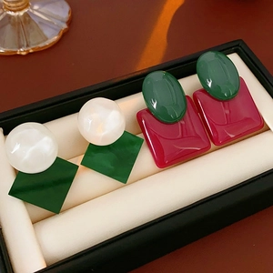Exaggerated resin stud earrings in geometric shapes of white, green and red colors