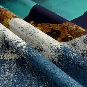 Close-up of modern abstract mountain tapestry showing thick textured fabric and soft drape