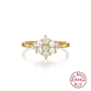 Detail of 925 sterling silver gold plated ring with marquise cluster zircon stones