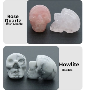 Detail view of hand-carved rose quartz and howlite crystal skulls for decor