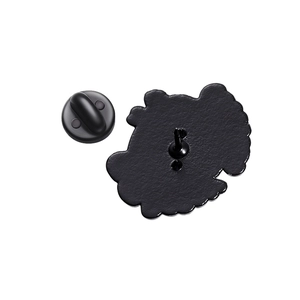 Detail of black metal badge back with a secure rubber butterfly clutch closure