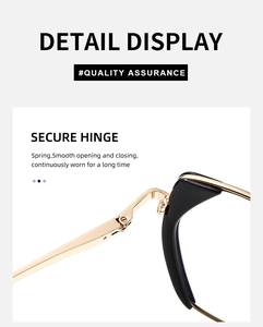 Detailed macro view of the durable gold metal spring hinge on black cat-eye glasses