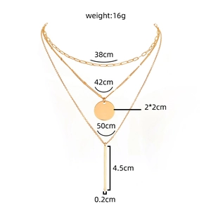 Minimalist gold-tone layered necklace set with round disk and bar pendant dangles