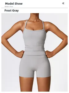 Front view of frost grey high-stretch yoga top and high-waist shorts on model