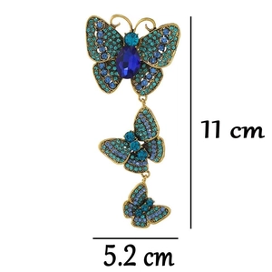 Detail showing vintage butterfly brooch dimensions at 11 cm height with turquoise rhinestones