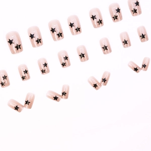 Cute cartoon star pink press-on nails with silver glitter gradient and black star patterns