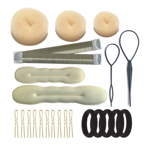 Hair styling tool set featuring sponge bun makers, pull hair needles, and clips on white base