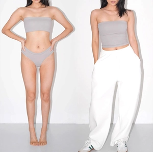 Detail of high-elastic seamless tube top and matching briefs shown with white wide-leg pants