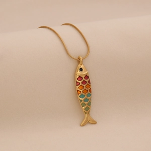 Detailed close-up of a colorful enamel fish pendant on a fine gold snake chain