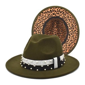 Detail of dark olive fedora with pearl rhinestone ribbon and leopard print underbrim
