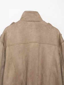 Detail shot of tan faux suede jacket collar and stitching with epaulette design