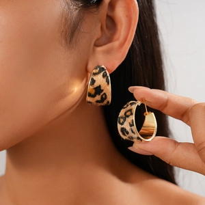 Chic leopard print C-shaped earrings with faux calf hair and golden metal finish