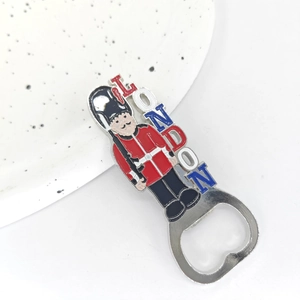 Detailed view of metal bottle opener shaped like a London soldier with LONDON lettering